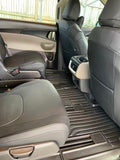 Black Kia Carnival seat covers showing the seat backs and second-row fit